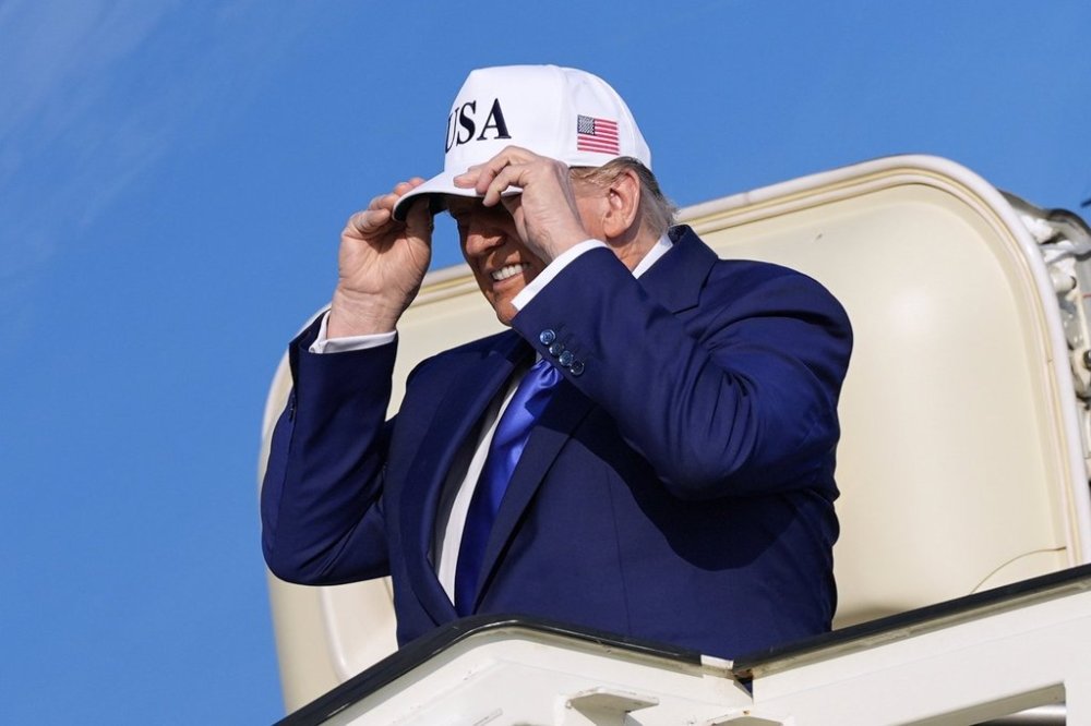President Donald Trump exits Air Force One as he arrives at Amsterdam Schiphol Airport ahead of the NATO summit, taking place in The Hague, Netherlands, Tuesday, June 24, 2025. (AP Photo/Alex Brandon)