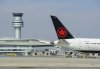 Planes sit on the tarmac at Pearson International Airport in Toronto on Wednesday, April 28, 2021. THE CANADIAN PRESS/Nathan Denette