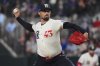 Texas Rangers starting pitcher Shawn Armstrong throws during the first inning of a baseball game against the Chicago White Sox, Friday, June 13, 2025, in Arlington, Texas. (AP Photo/LM Otero)