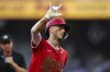 Los Angeles Angels' Zach Neto reacts after hitting a solo home run in the fourth inning of a baseball game against the Atlanta Braves, Thursday, July 3, 2025, in Atlanta. (AP Photo/Colin Hubbard)