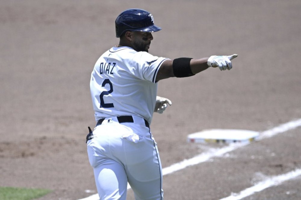 Tampa Bay Rays' Yandy Díaz (2) reacts after hitting a two-run home run during the fifth inning of a baseball game against the Miami Marlins, Sunday, June 8, 2025 in Tampa, Fla. (AP Photo/Phelan M. Ebenhack)
