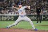 FILE - Chicago Cubs relief pitcher Nate Pearson throws to the Los Angeles Dodgers in the fifth inning of an MLB Tokyo Series baseball game in Tokyo, March 19, 2025. (AP Photo/Eugene Hoshiko, File)