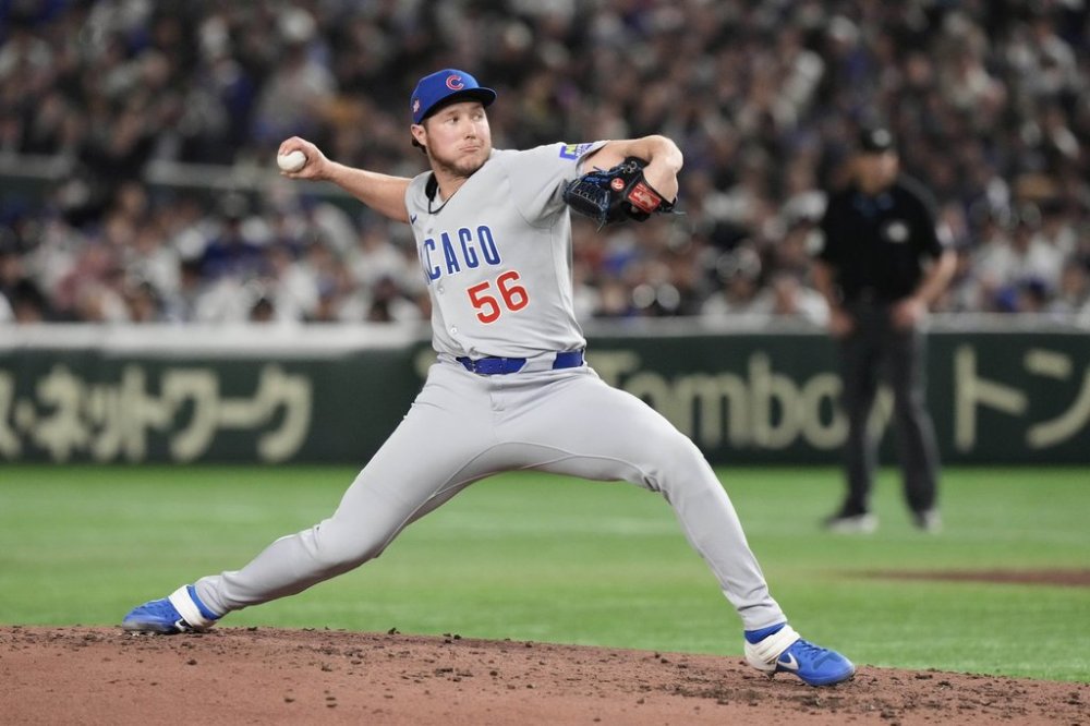 FILE - Chicago Cubs relief pitcher Nate Pearson throws to the Los Angeles Dodgers in the fifth inning of an MLB Tokyo Series baseball game in Tokyo, March 19, 2025. (AP Photo/Eugene Hoshiko, File)