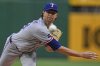 Texas Rangers pitcher Jacob deGrom delivers during the first inning of a baseball game against the Pittsburgh Pirates in Pittsburgh, Friday, June 20, 2025. (AP Photo/Gene J. Puskar)