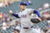 Texas Rangers starting pitcher Tyler Mahle (51) delivers against the Minnesota Twins during the first inning of baseball game Tuesday, June 10, 2025, in Minneapolis. (AP Photo/Matt Krohn)