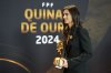 FILE - S.L. Benfica women's soccer champion coach Filipa Patao leaves with her award after the Portuguese soccer awards gala in Lisbon, Nov. 12, 2024. (AP Photo/Armando Franca, File)