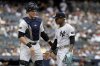 New York Yankees first baseman Ben Rice, left, and Marcus Stroman react walking off during the second inning of a baseball game against the Athletics, Sunday, June 29, 2025, in New York. (AP Photo/Adam Hunger)