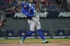 Toronto Blue Jays' George Springer hits a home run in the eighth inning of a baseball game against the Cleveland Guardians in Cleveland, Tuesday, June 24, 2025. (AP Photo/Sue Ogrocki)