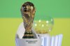 FILE - The World Cup trophy is displayed before the UEFA Preliminary Draw for the 2026 FIFA World Cup soccer tournament at FIFA headquarters in Zurich, Switzerland, Dec. 13, 2024. (Til Buergy/Keystone via AP, File)
