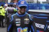 Ricky Stenhouse Jr. walks to his car before a NASCAR Cup Series auto race at Hermanos Rodríguez race track in Mexico City, Sunday, June 15, 2025. (AP Photo/Fernando Llano)
