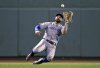Toronto Blue Jays center fielder Kevin Pillar makes the catch on a fly out by Boston Red Sox's Mookie Betts during the sixth inning of a baseball game at Fenway Park in Boston, Tuesday, Sept. 11, 2018. (AP Photo/Charles Krupa)
