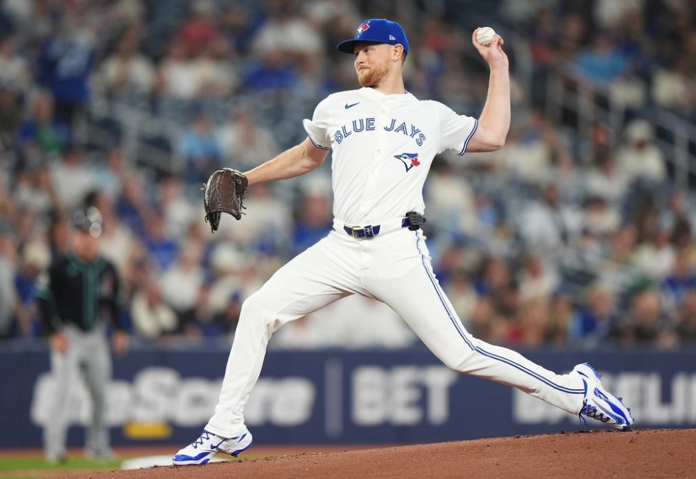 Blue Jays pitcher Eric Lauer (56) works against the Arizona Diamondbacks during first-inning MLB action in Toronto on Wednesday, June 18, 2025. THE CANADIAN PRESS/Frank Gunn