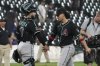 Arizona Diamondbacks catcher Jose Herrera, left, celebrates with center fielder Alek Thomas after the Diamondbacks defeated the Chicago White Sox in a baseball game in Chicago, Tuesday, June 24, 2025. (AP Photo/Nam Y. Huh)