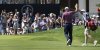 Padraig Harrington, left, high fives his caddie, Ronan Flood, after Harrington chipped in for a birdie on the 18th hole during the third round of the 45th U.S. Senior Open Championship Saturday, June 28, 2025, at the Broadmoor Golf Club in Colorado Springs, Colo. (Christian Murdock/Colorado Springs Gazette via AP)