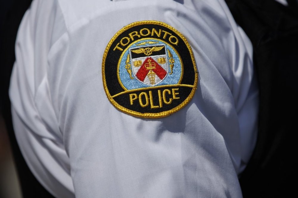 A Toronto Police emblem is shown in Toronto on Aug. 5, 2022. THE CANADIAN PRESS/Cole Burston