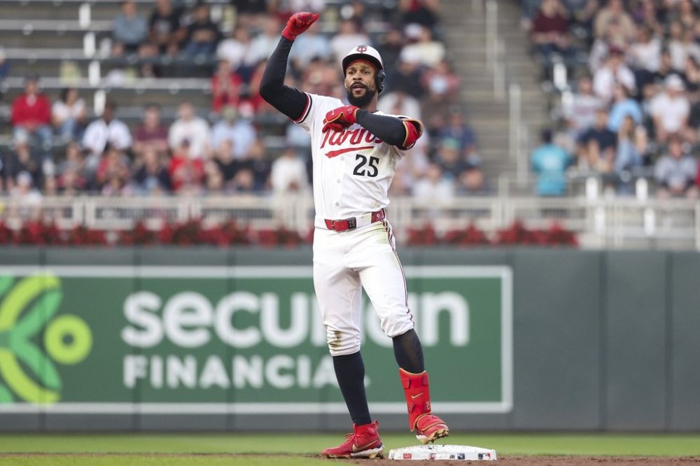 Minnesota Twins' Byron Buxton celebrates his double against the Texas Rangers during the fifth inning of baseball game Wednesday, June 11, 2025, in Minneapolis. (AP Photo/Matt Krohn)