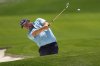 FILE - Padraig Harrington, of Ireland, hits from the bunker on the 18th hole during the first round of the PGA Championship golf tournament at the Quail Hollow Club, May 15, 2025, in Charlotte, N.C. (AP Photo/David J. Phillip, File)