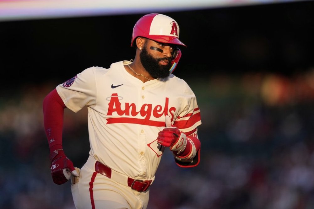 Los Angeles Angels' Jo Adell rounds third after hitting a solo home run during the second inning of a baseball game against the Seattle Mariners, Saturday, June 7, 2025, in Anaheim, Calif. (AP Photo/Mark J. Terrill)