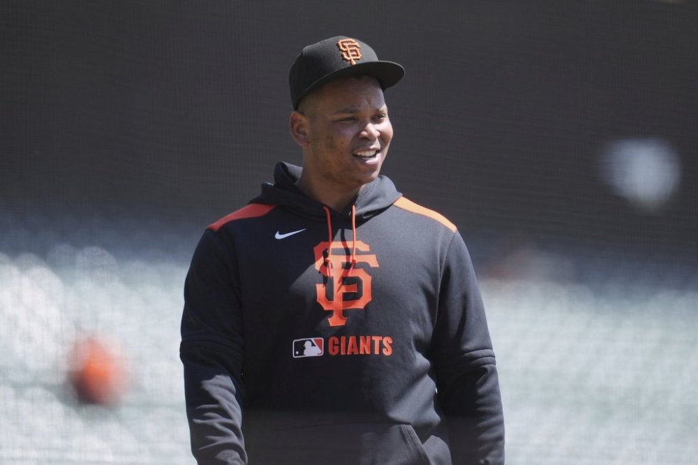 San Francisco Giants' Rafael Devers walks onto the field before a baseball game against the Cleveland Guardians in San Francisco, Thursday, June 19, 2025. (AP Photo/Jeff Chiu)