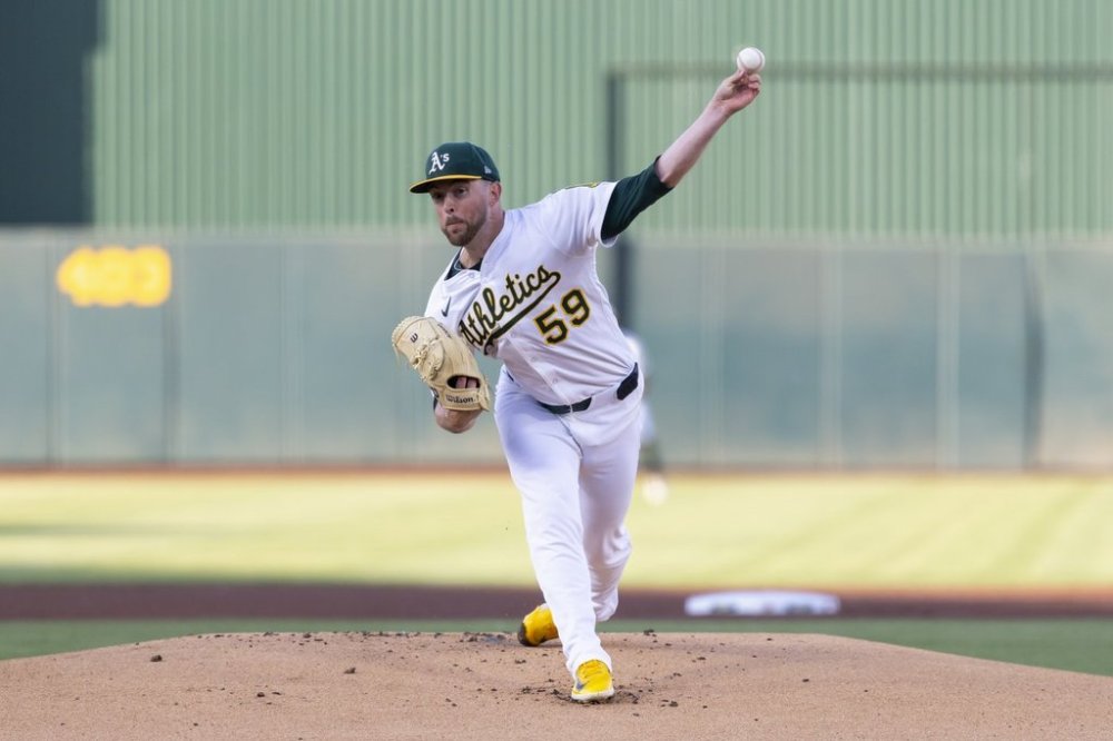 Athletics pitcher Jeffrey Springs throws to the Cleveland Guardians during the first inning of a baseball game Friday, June 20, 2025, in West Sacramento, Calif. (AP Photo/Sara Nevis)