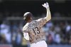 San Diego Padres' Manny Machado rounds the bases after hitting a solo home run during the fourth inning of a baseball game against the Texas Rangers, Friday, July 4, 2025. (AP Photo/Denis Poroy)