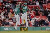 Boston Red Sox Wilyer Abreu (52) is congratulated by Carlos Narvaez (75) after hitting a home run during the first inning of the first baseball game of a doubleheader against the Baltimore Orioles, Saturday, May 24, 2025, at Fenway Park in Boston. (AP Photo/Mary Schwalm)