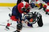 Linesman Trent Knorr gets between Florida Panthers centre Sam Bennett (top) and Edmonton Oilers winger Trent Frederic during the third period in Game 3 of the Stanley Cup final in Sunrise, Fla., on Monday, June 9, 2025. THE CANADIAN PRESS/Nathan Denette
