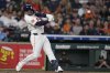 Houston Astros' Christian Walker hits a two-run double against the Chicago White Sox during the third inning of a baseball game Wednesday, June 11, 2025, in Houston. (AP Photo/David J. Phillip)