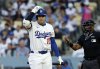 Los Angeles Dodgers' Shohei Ohtani reacts after striking out against the Chicago White Sox during the second inning of a baseball game Tuesday, July 1, 2025, in Los Angeles. (AP Photo/Kevork Djansezian)