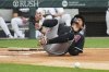 Arizona Diamondbacks' Ildemaro Vargas reacts after hit by pitch from Chicago White Sox relief pitcher Mike Vasil during the second inning of a baseball game in Chicago, Tuesday, June 24, 2025. (AP Photo/Nam Y. Huh)