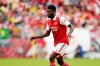 FILE - Arsenal midfielder Thomas Partey runs with the ball against Everton during the first half of a pre-season friendly soccer match, Saturday, July 16, 2022, in Baltimore. (AP Photo/Julio Cortez, File)