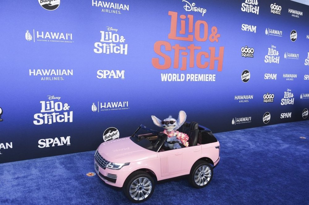 Stitch arrives at the premiere of