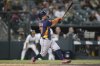 Houston Astros' Jose Altuve hits a three run home run against the Athletics during the sixth inning of a baseball game Wednesday, June 18, 2025, in West Sacramento, Calif. (AP Photo/Scott Marshall)