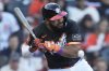 San Francisco Giants' Heliot Ramos is hit by a pitch from Cleveland Guardians pitcher Slade Cecconi during the first inning of a baseball game in San Francisco, Tuesday, June 17, 2025. (AP Photo/Jeff Chiu)