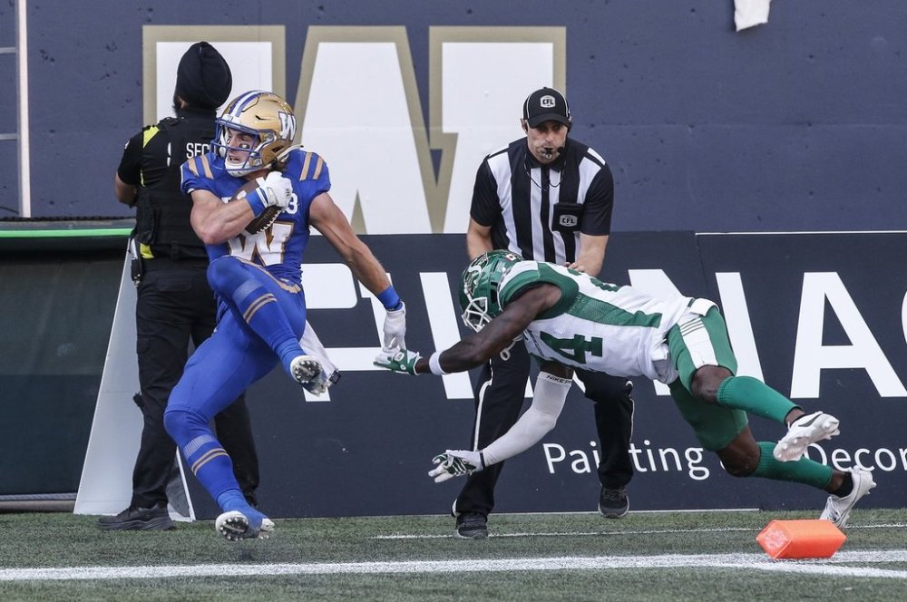 Winnipeg Blue Bombers' Dalton Schoen (83) catches a touchdown pass during the first half of CFL football action against the Saskatchewan Roughriders in Winnipeg Saturday, September 9, 2023. THE CANADIAN PRESS/John Woods