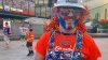 Edmonton Oilers superfan Jacob Golka, who paints fans' faces at the Moss Pit watch party outside Rogers Place in Edmonton, is seen in this image from video on Monday, June 9, 2025. THE CANADIAN PRESS/Jack Farrell