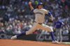 FILE - Seattle Mariners starting pitcher Logan Gilbert throws against the Texas Rangers during the second inning of a baseball game, April 13, 2025, in Seattle. (AP Photo/Lindsey Wasson, File)