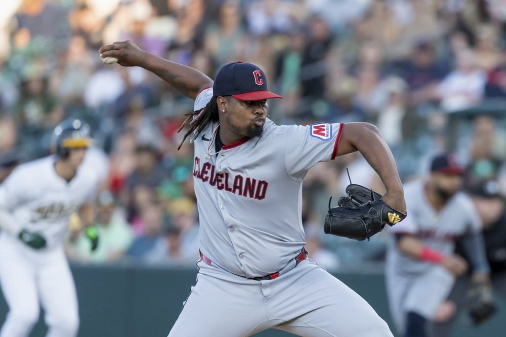 Cleveland Guardians pitcher Luis L. Ortiz throws to the Athletics during the second inning of a baseball game Saturday, June 21, 2025, in West Sacramento, Calif. (AP Photo/Sara Nevis)