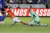 CF Montréal goalkeeper Jonathan Sirois, right, blocks a shot on goal by Houston Dynamo forward Gabriel Segal, second from right, during the second half of an MLS soccer match Saturday, June 14, 2025, in Houston. (AP Photo/Michael Wyke)