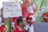 A Portuguese supporter holds a sign during a fanwalk reading ''Thank you Diogo Jota RIP'', in memory of Portuguese international footballer Diogo Jota, who lost his life in a car crash in Spain on Thursday night, prior the UEFA Women's EURO 2025 Group B soccer match between Spain and Portugal, in Bern, Switzerland, Thursday, July 3, 2025. (Til Buergy/Keystone via AP)