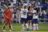 United States midfielder Sam Coffey (17), middle right, celebrates with teammates after scoring a goal during the first half of an international friendly soccer match against China, Saturday, May 31, 2025, in St. Paul, Minn. (AP Photo/Abbie Parr)