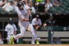 Chicago White Sox's Lenyn Sosa (50) hits a two-run home run during the fourth inning of a baseball game against the Arizona Diamondbacks, Wednesday, June 25, 2025, in Chicago. (AP Photo/Erin Hooley)