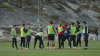 Greenland's soccer and futsal players huddle during a training session at Nuuk stadium in Nuuk, Greenland, Tuesday, June 17, 2025. (AP Photo/Kwiyeon Ha)