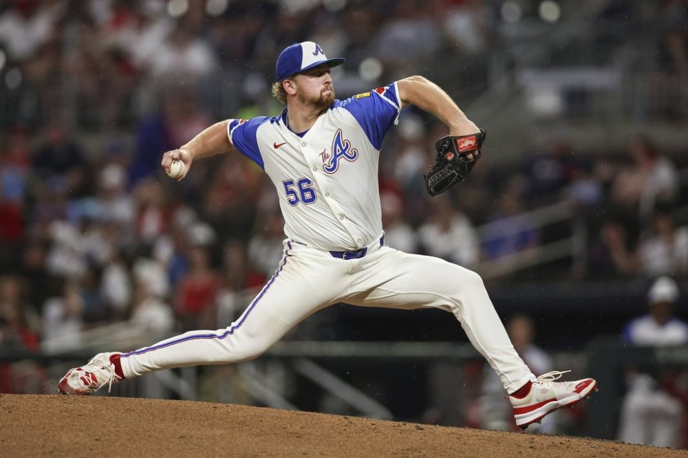 Atlanta Braves pitcher Spencer Schwellenbach (56) delivers in the seventh inning of a baseball game against the Philadelphia Phillies, Saturday, June 28, 2025, in Atlanta. (AP Photo/Colin Hubbard)
