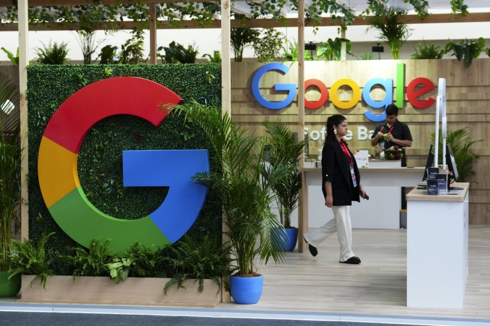 Participants make their way through a Google booth and display at the APEC summit in Lima, Peru on Friday, Nov. 15, 2024. THE CANADIAN PRESS/Sean Kilpatrick
