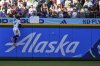 Seattle Mariners center fielder Julio Rodriguez misjudges a ball hit by Kansas City Royals' Salvador Perez to allow a two-run double during the fifth inning of a baseball game Tuesday, July 1, 2025, in Seattle. (AP Photo/Lindsey Wasson)