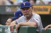 Texas Rangers manager Bruce Bochy stands in the dugout during a baseball game against the Pittsburgh Pirates in Pittsburgh, Friday, June 20, 2025. (AP Photo/Gene J. Puskar)