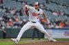 Baltimore Orioles starting pitcher Trevor Rogers delivers during the third inning of a baseball game against the Texas Rangers, Monday, June 23, 2025, in Baltimore. (AP Photo/Stephanie Scarbrough)