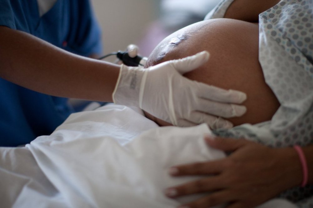 A pregnant woman is examined as she waits to give birth at a public hospital in Rio de Janeiro on Wednesday, July 25, 2012. THE CANADIAN PRESS/AP, Felipe Dana