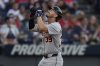 Detroit Tigers' Zach McKinstry gestures as he runs to home plate with a home run in the fourth inning of a baseball game against the Cleveland Guardians in Cleveland, Friday, July 4, 2025. (AP Photo/Sue Ogrocki)